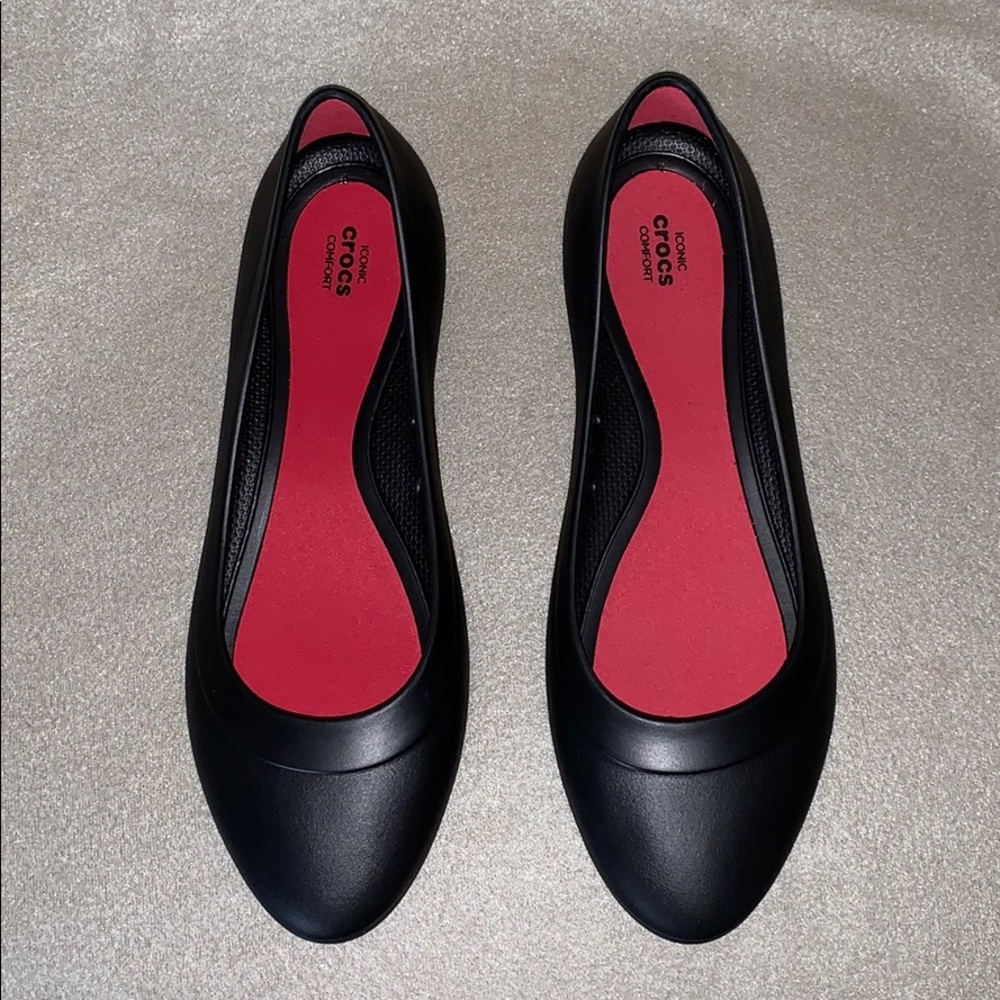 Never worn Crocs lined flats